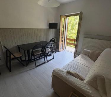 Faidello Apartment | Cozy Mountain Apartment with Cimone view