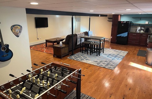 Phoenix House | Cozy Oswego River Area Basement Suite Sunroom & Hot Tub in Phoenix NY