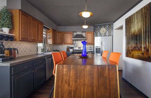 Seven Hills House | Cozy, pet friendly, Mid-Century style home loaded with books, movies, games.