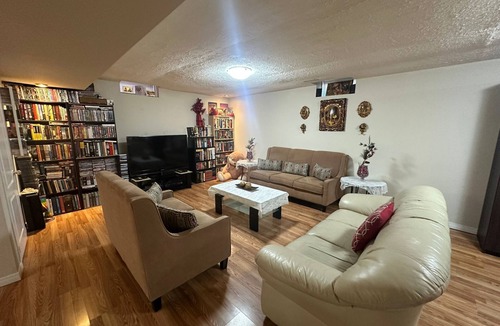 Brampton House | "Cozy, private basement with kitchenette, washroom, and small gym.