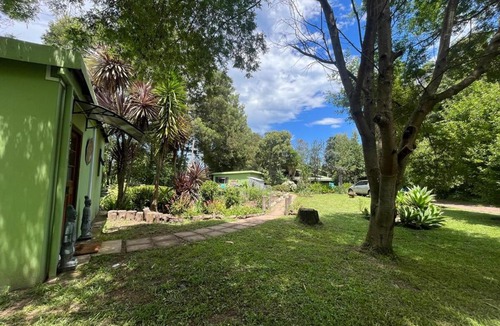 Storms River Ski Chalet | Cozy private cottage with garden views at Ferngrove