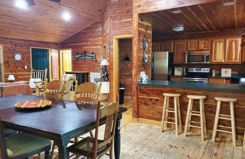 Pangburn Cabin | Cozy riverfront cabin! Great fishing & fun for the whole family.