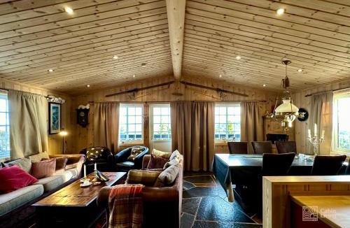 Ringsaker House | Cozy spacious cabin with sauna at Natrudstilen