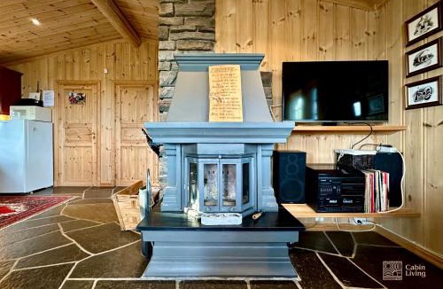Ringsaker House | Cozy spacious cabin with sauna at Natrudstilen