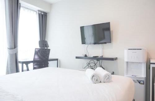 Kayu Putih Apartment | Cozy Studio at Tifolia Apartment By Travelio