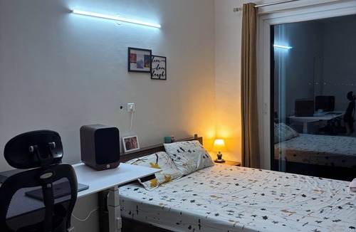 Agara Apartment | Cozy studio in pleasant Haralur with WiFi, AC and lake View