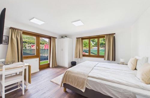 Gamsen Apartment | Cozy Studio with a Garden