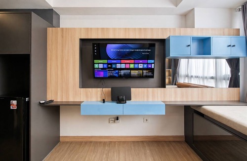 Panunggangan Utara Apartment | Cozy Studio With Murphy Bed At Collins Boulevard Apartment