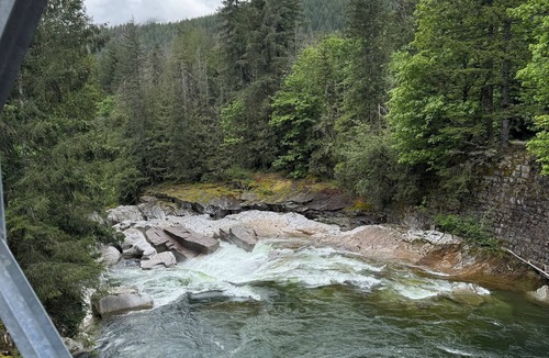 Gold Bar Cabin | Cozy Tiny Cabin with RIVER VIEWS! Sleeps 3, hot tub, wood stove, fire pit!