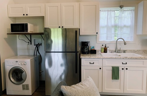 Greenwood Cabin | Cozy tiny cabin with sunrise view! Short drive to beaches and turf.
