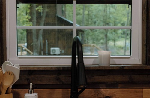 Lawrence County Cabin | Cozy Tiny Home in the woods of Middle Tennessee with AC and high speed internet
