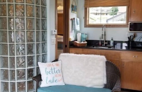 Lake Goodwin House | Cozy Tiny House Style Cabin with Hot Tub on Waterfront