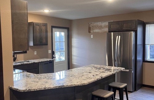 Bemidji House | Cozy two level home - 2 minutes from beach on private wooded lot.