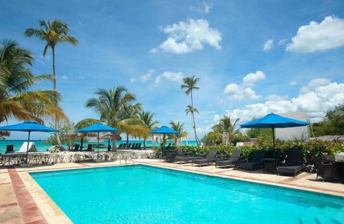 Dominicus Apartment | Cozy unit inside resort-style complex. Beachfront, Pools, Waterpark.