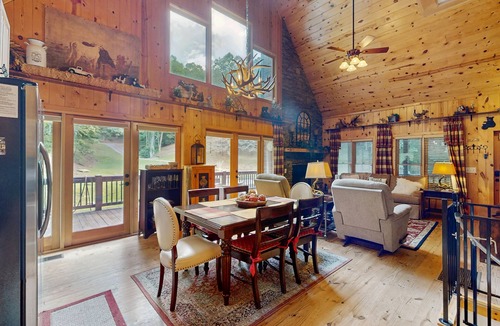 Sky Valley Cabin | Cozy waterfront home w/hot tub, swing, firepit, and fireplace