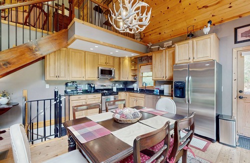 Sky Valley Cabin | Cozy waterfront home w/hot tub, swing, firepit, and fireplace