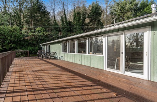 Lacey House | Creekside charmer with kayaks, fireplace, large deck, & W/D - dog-friendly