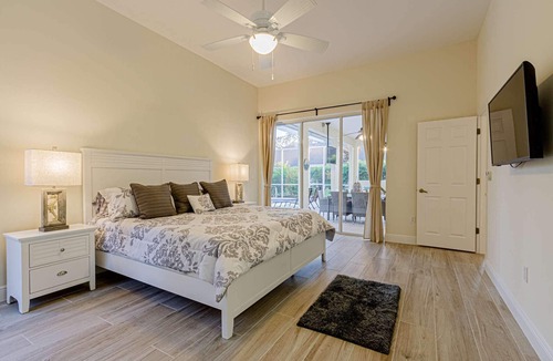 Crown Pointe House | Crown Pointe Heated Pool Home, Covered Lanai w/TV- Renovated w/Coastal Flair, King in Master