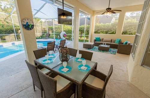 Crown Pointe House | Crown Pointe Heated Pool Home, Covered Lanai w/TV- Renovated w/Coastal Flair, King in Master