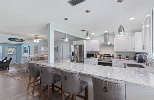 Indian Waters House | Crystal River Pool Home ~ Waterfront w/Boat Dock, Hot Tub & fenced backyard.
