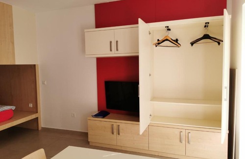 Ljubljana City Centre Apartment | Cube studio by the river (with free bike rental)
