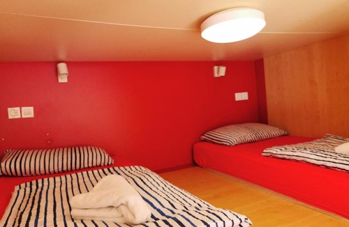 Ljubljana City Centre Apartment | Cube studio by the river (with free bike rental)