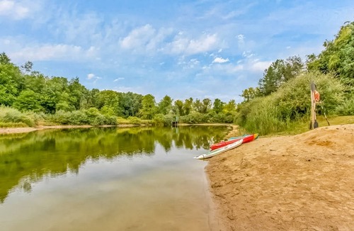 Metamora House | Custom dog-friendly home with private swimming area, fireplace, gym, grill, deck