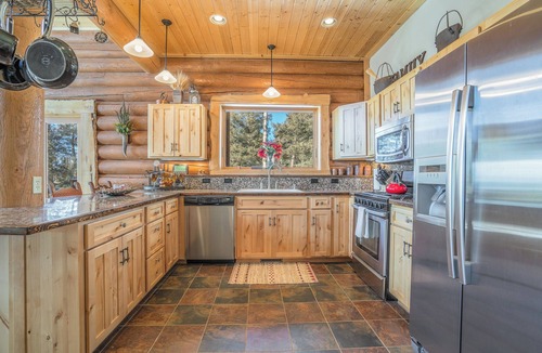 Angel Fire Ski Chalet | Custom high-end 3 bedroom log cabin sleeps 12. Located on the ski hill!