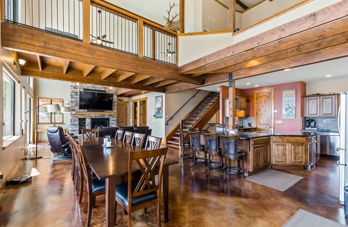Laclede House | Custom riverfront home with private dock, game room, hot tub & heated floors
