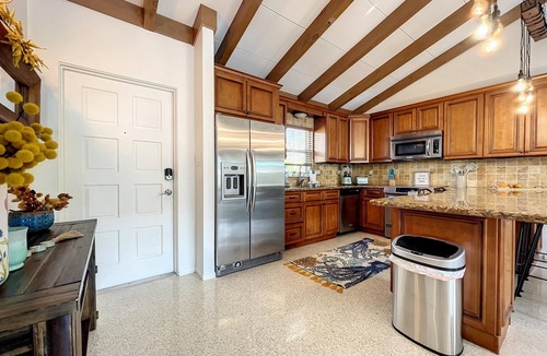 Whitney Beach House | Cute canal front Cottage with dock & boat lift and pool ,short walk to the beach