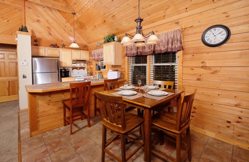 Sevierville Cabin | Cutest, comfiest log cabin with great screened in porch!