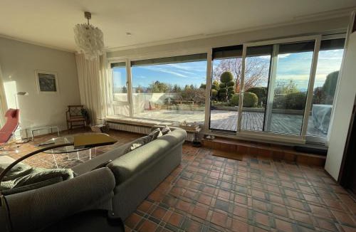 Tutzing Apartment | Dachterrassen Ferienwohnung mit See- u. Bergblilck
