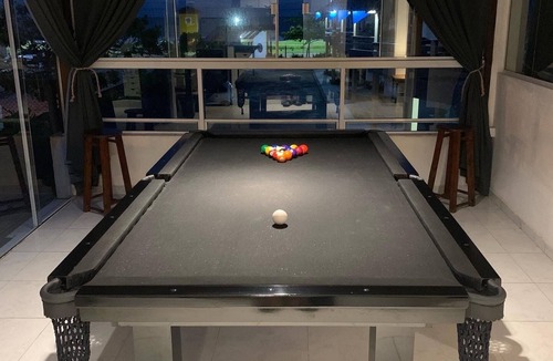 Itapoa Apartment | Deck with pool table near the sea, Itapoá-SC 3 bedrooms
