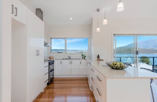 Lindisfarne House | Deep Blue Wow views over river city mountain