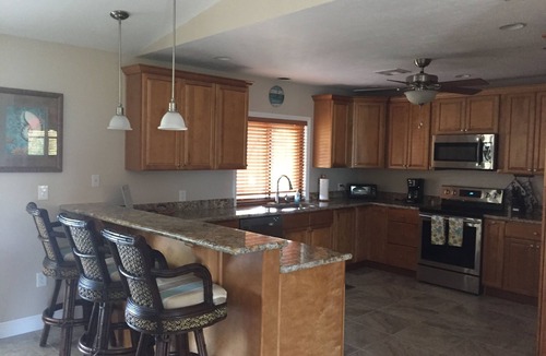 Little Torch Key House | Deep Water Corner Canal Lot with Heated Pool, Tiki Hut & 240' Dock