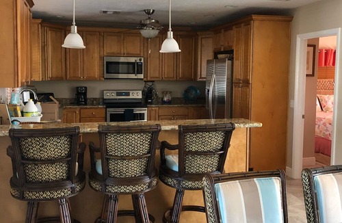 Little Torch Key House | Deep Water Corner Canal Lot with Heated Pool, Tiki Hut & 240' Dock