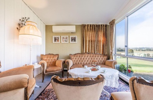 Woodville House | Dei Gratia High Tea House, 11A Loch Goyle Dr, Woodville - a quirky retreat with linen, aircon and Wi-Fi