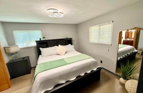 West Newton Apartment | Delightful 3 Bd Home with King size bed, hot tub, playground!