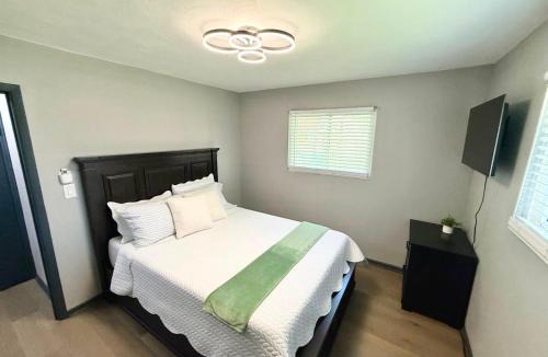 West Newton Apartment | Delightful 3 Bd Home with King size bed, hot tub, playground!