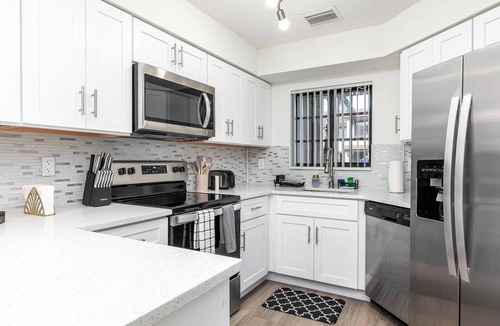 Delray Beach House | Delray Townhome | Heated Pool, Gym, 10 Min to Beach