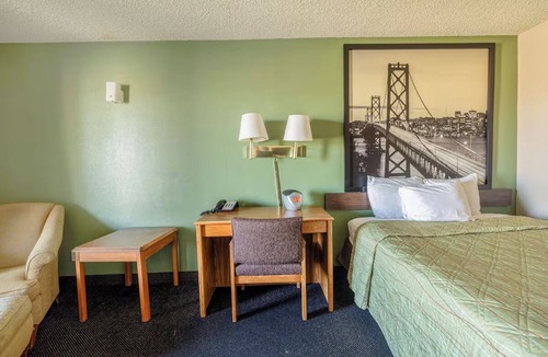 Barstow Hotel | Deluxe King Bed Comfy Room Surrounded by Route 66 History in Barstow