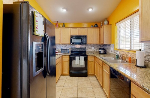 Power Ranch House | Desert oasis with an enclosed yard, firepit, washer/dryer, and central AC