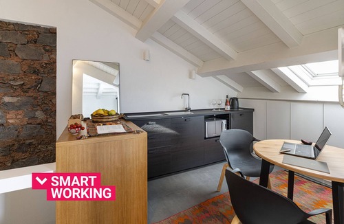 Cannizzaro Apartment | Design Apartment with Terrace by Wonderful Italy