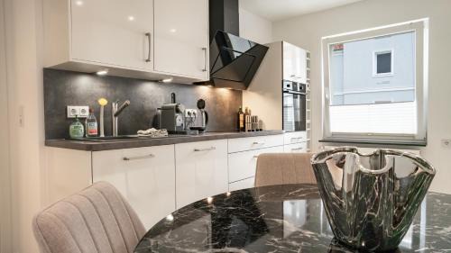 Wolfsburg Apartment | Design Apartment Wolfsburg II, mit Terrasse Smart TV, HighSpeed WLAN, Nespresso Maschine