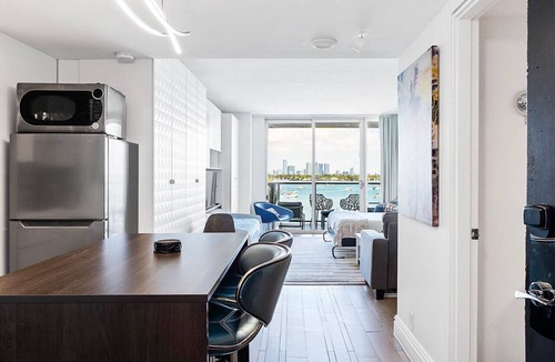 West Avenue Condo | Design Studio Miami Beach Stunning Bay View Balcony Queen Murphy & twin trundle
