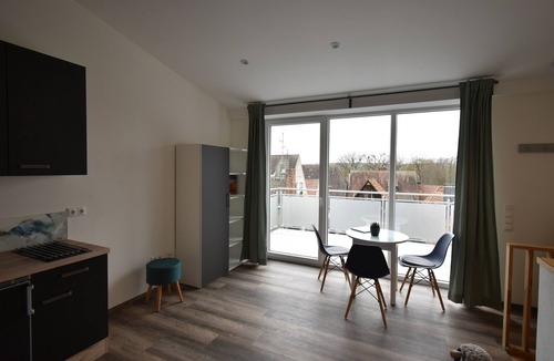 Volkach Apartment | Designer apartment with balcony in the heart of the old town
