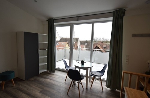 Volkach Apartment | Designer apartment with balcony in the heart of the old town