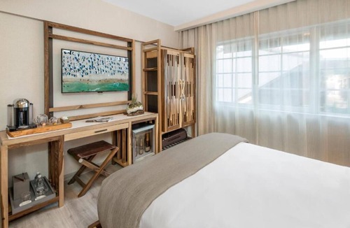 City Center Hotel | Designer Beachside Hotel: Contemporary Style, Pool, Dining, & Perfect Location
