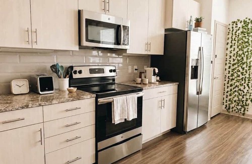 Las Colinas Apartment | Designer Game Suite Resort Amenities DART Rail