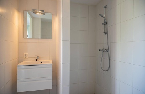 Amsterdam House | Detached bungalow with a patio with garden furniture and a private parking space